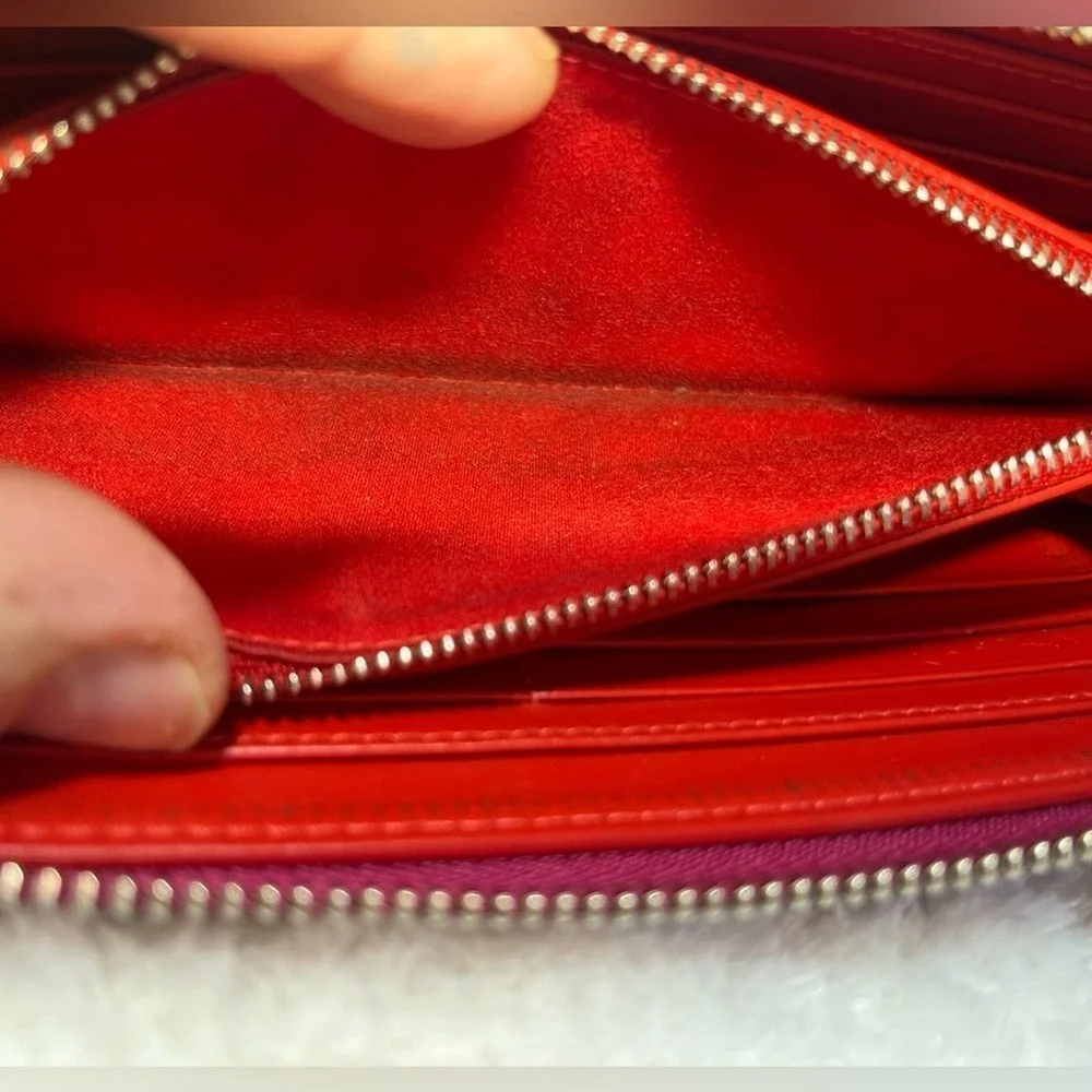 Christian Louboutin Zip Around Panetone Studded wallet in Wine Color, Leather